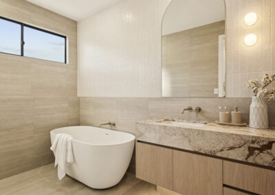 Custom cabinetry Tarragindi Brisbane featuring Polytec Blonde Oak Woodmatt kitchen joinery and stone benchtops.