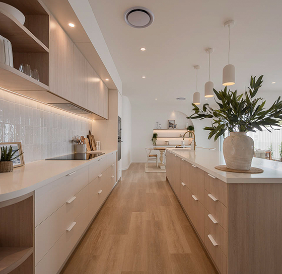 Custom kitchen cabinetry Moreton Bay with Formica Soft Oak island and Better White stone by Zente Kitchens